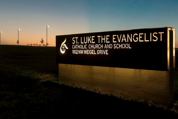 st luke school sign car hits students